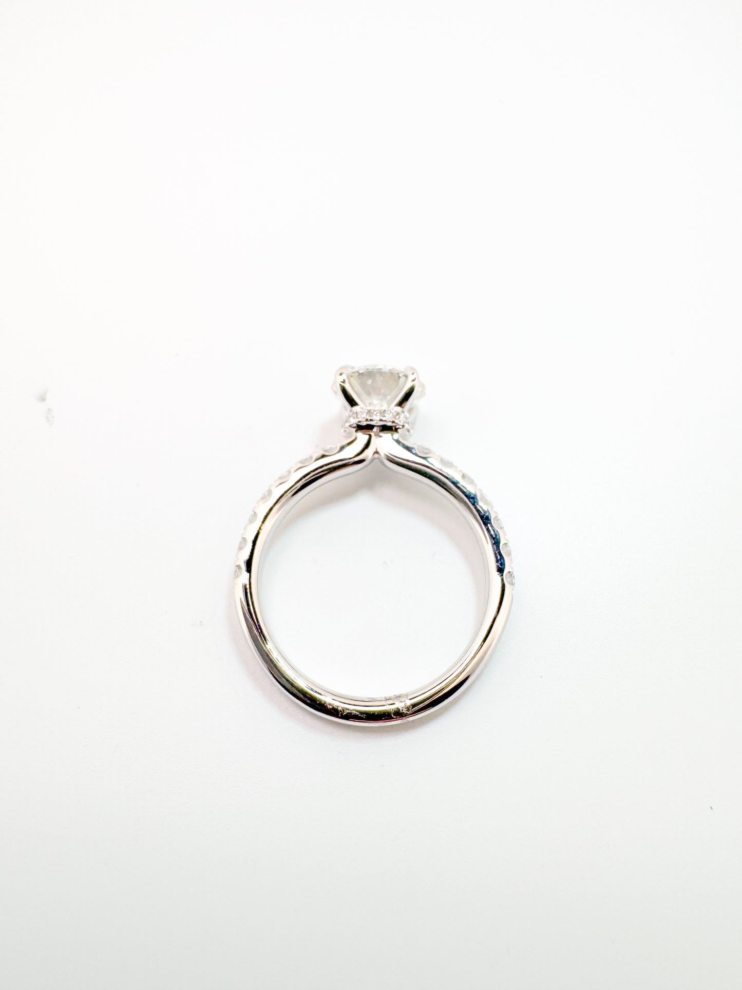 14K, white gold, 2.08 lab grown VS2 G Round brilliant set with .42 carats of side diamonds. IGI certified