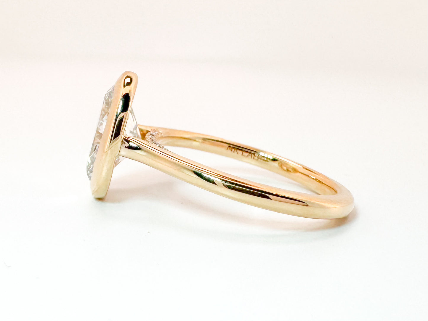 14K, Yellow gold, 2.04 carat, lab grown oval engagement ring. VVS2 F  IGI Certified