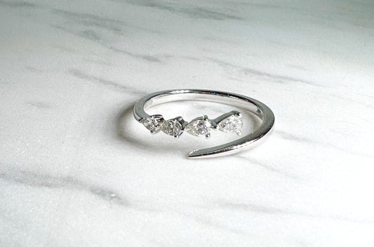 14k, white gold .25 diamond total weight pear shaped diamond band