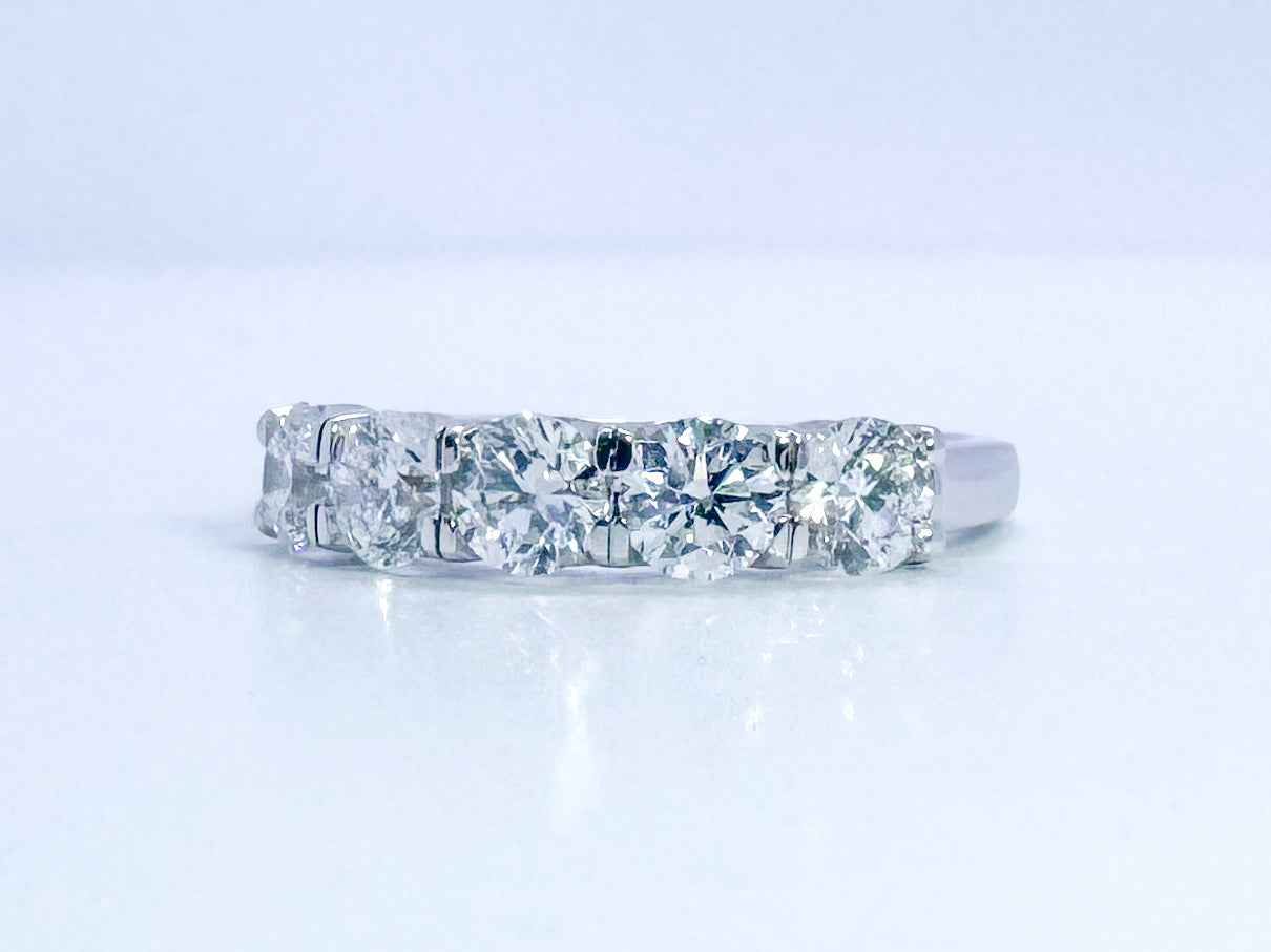 14K, white gold, 5 diamond band 1.50 diamond total weight. Lab grown