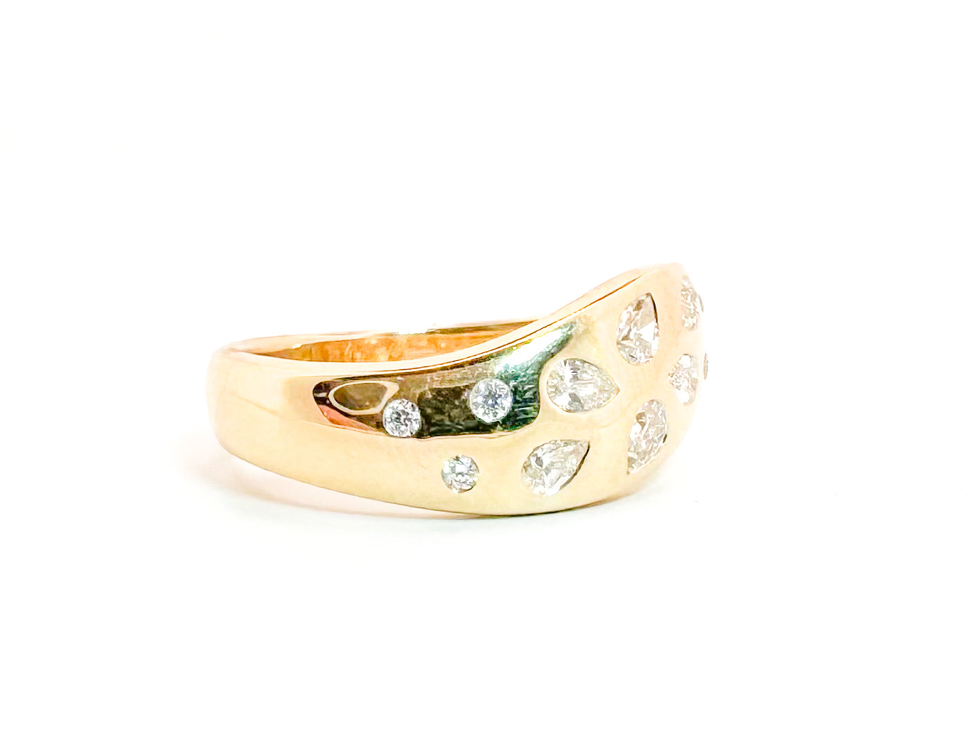 14K, yellow gold flush set .45 carat total weight diamond fashion ring.