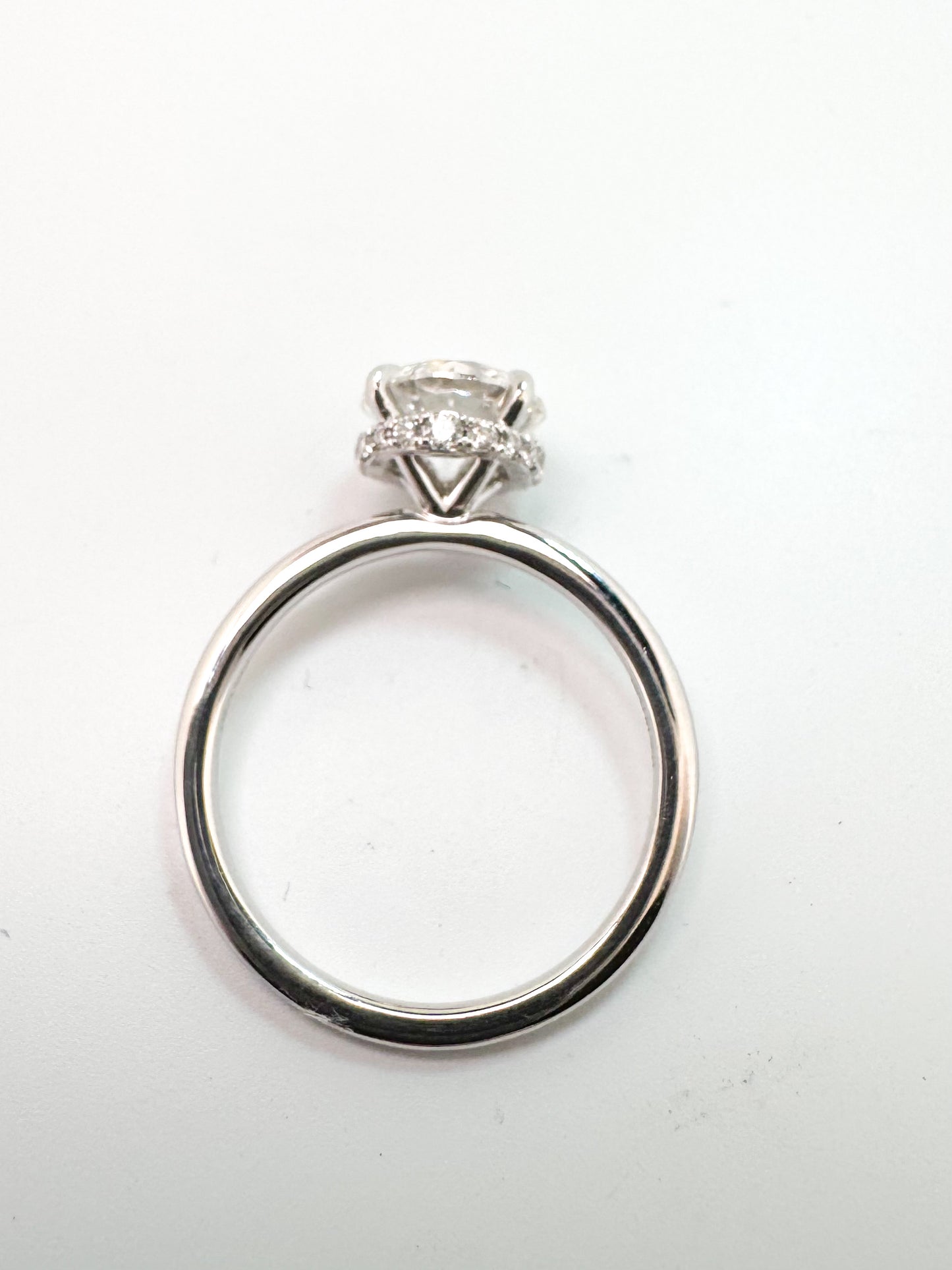 14K, White gold, 2.00 carat center stone lab grown with a hidden halo.