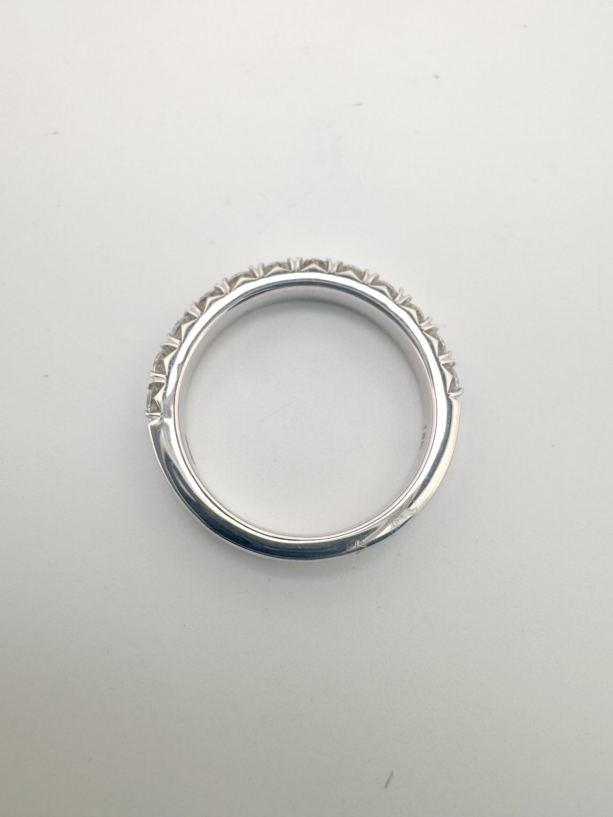 18K, White gold, .78 diamond total weight, natural diamond band.
