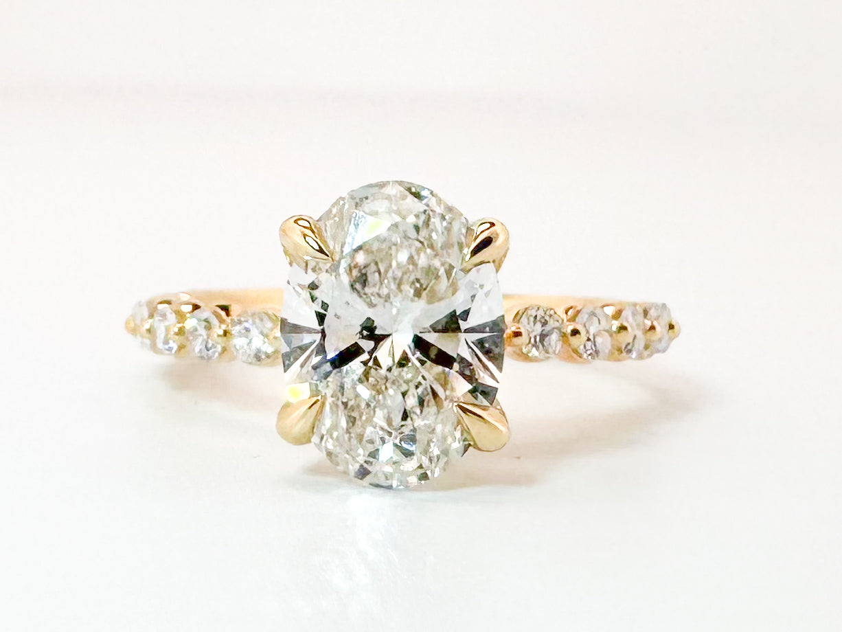 14K, Yellow gold, 2.04 carat, Lab grown oval diamond,  set with .35 carats of side diamonds. IGI Certified