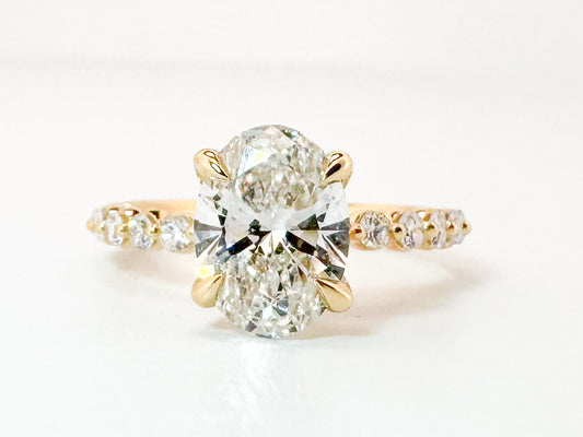 14K, Yellow gold, 2.04 carat, Lab grown oval diamond,  set with .35 carats of side diamonds. IGI Certified