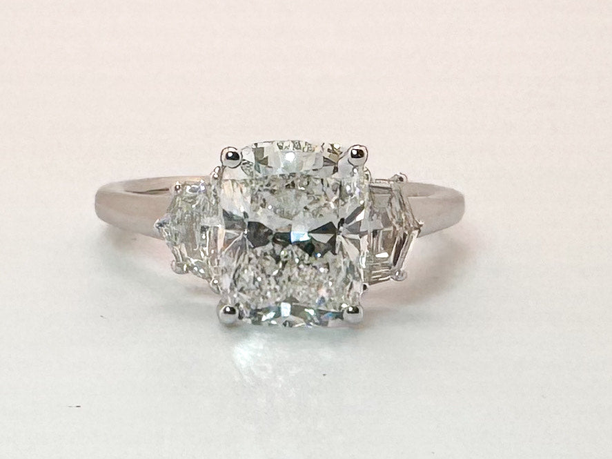 14kw 2.54 lab grown  cushion cut center , set with .54 total weight Epaulette cut side diamonds.