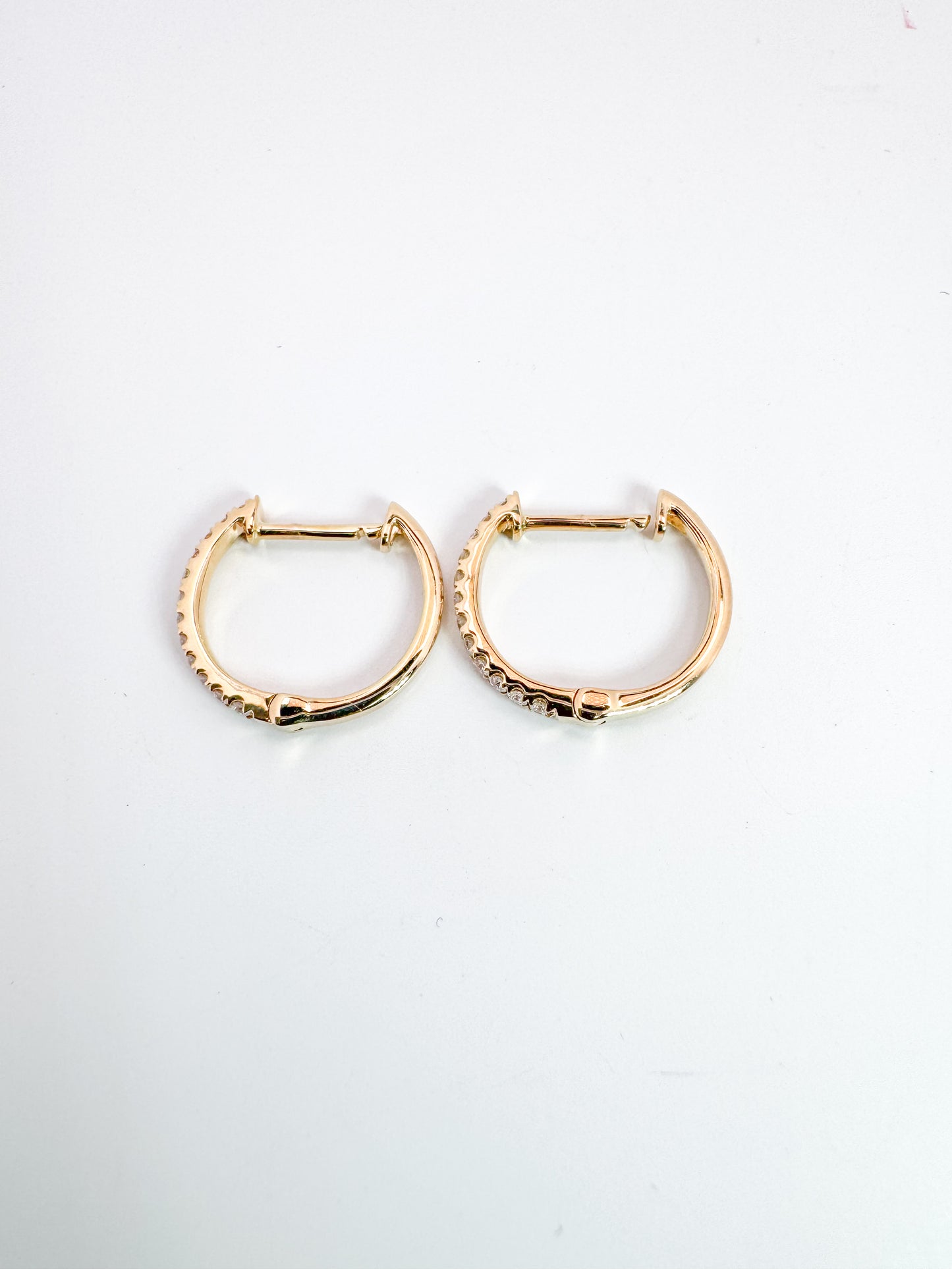 14k, Yellow gold, .15 diamond total weight, huggie diamond earrings.