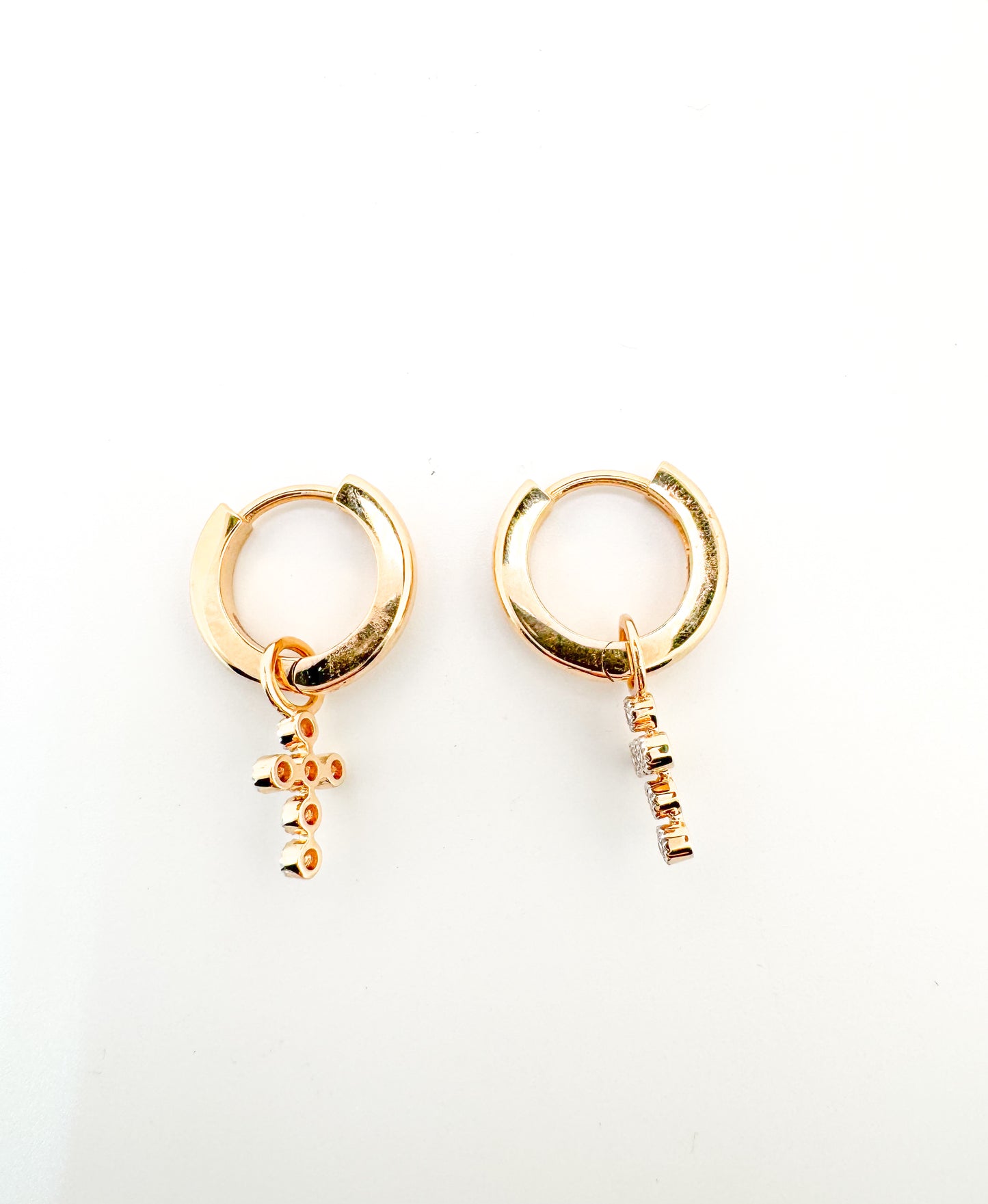 14K, yellow gold, .14 diamond total weight. cross  lab diamond earring