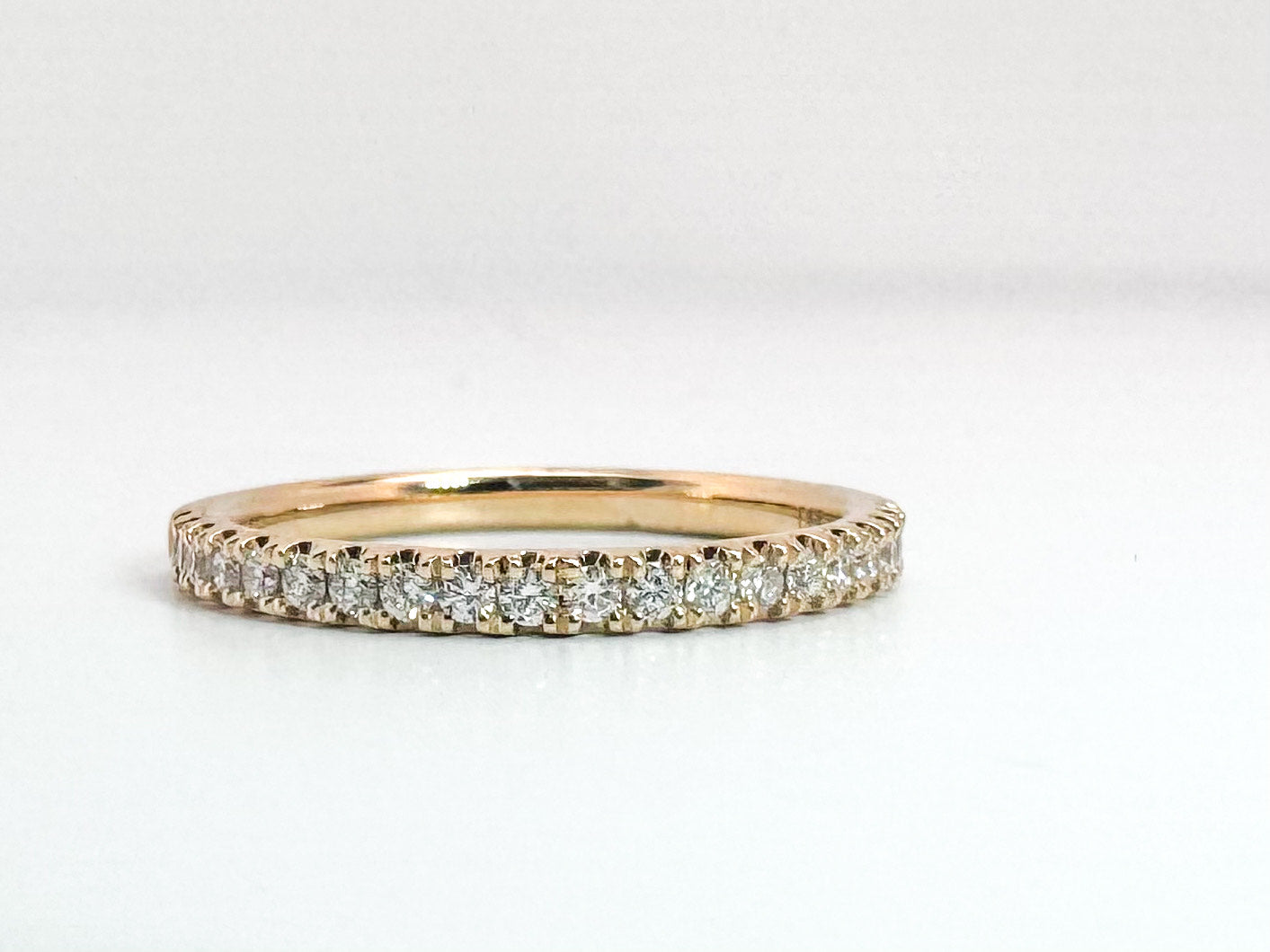 14k yellow gold .25 diamond total weight, french pave diamond wedding band.
