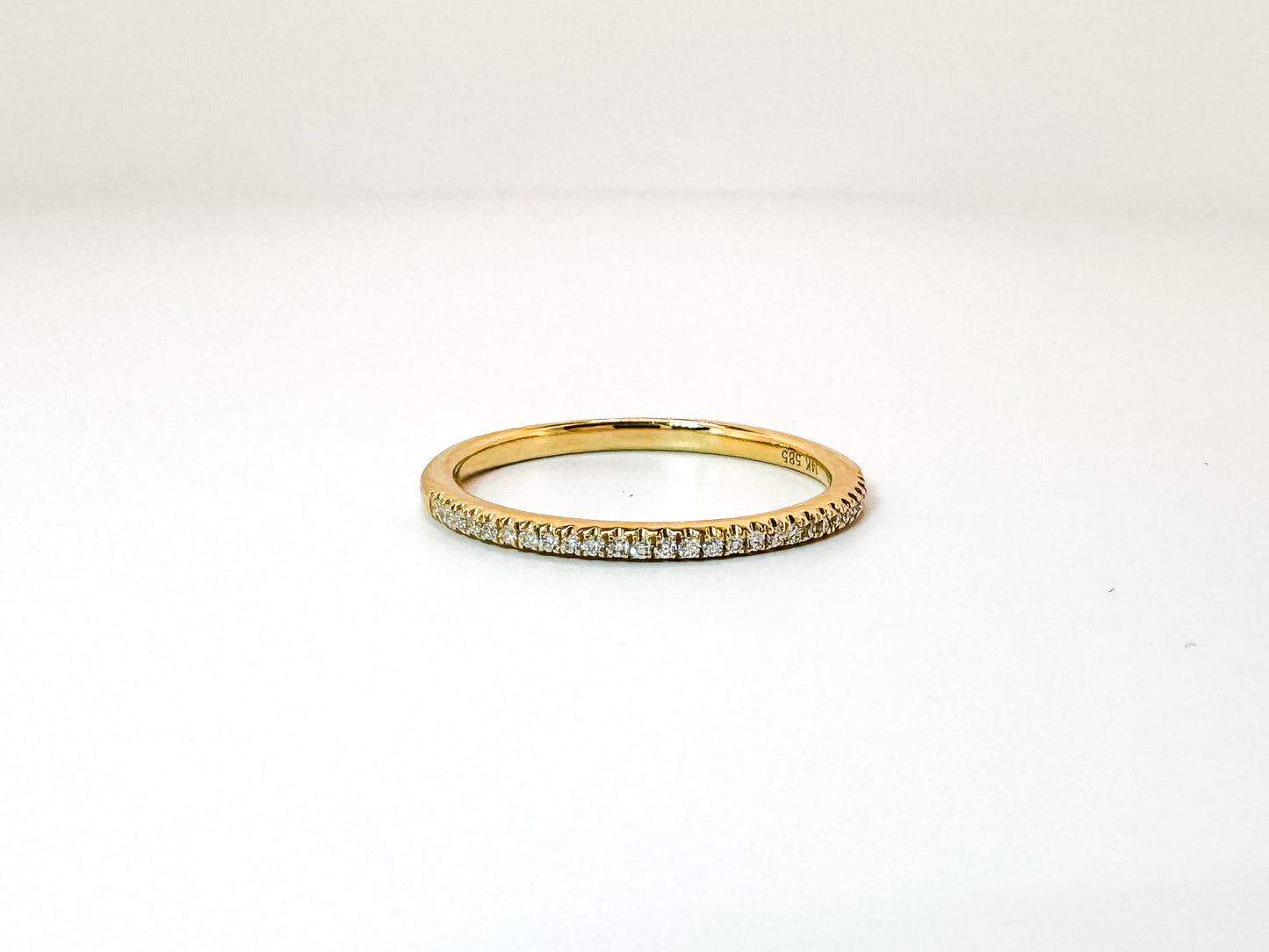 14k,Yellow gold, .08 carat diamond wedding band.