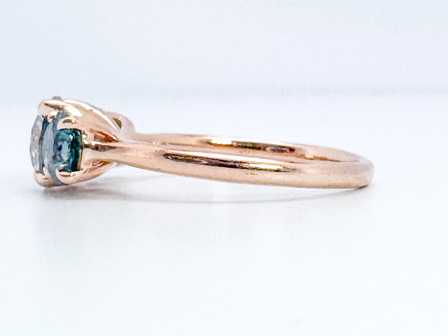 14k, rose gold, 1.02 carat Natural grey diamond set with 1.00 carat total weight natural montana sapphires.