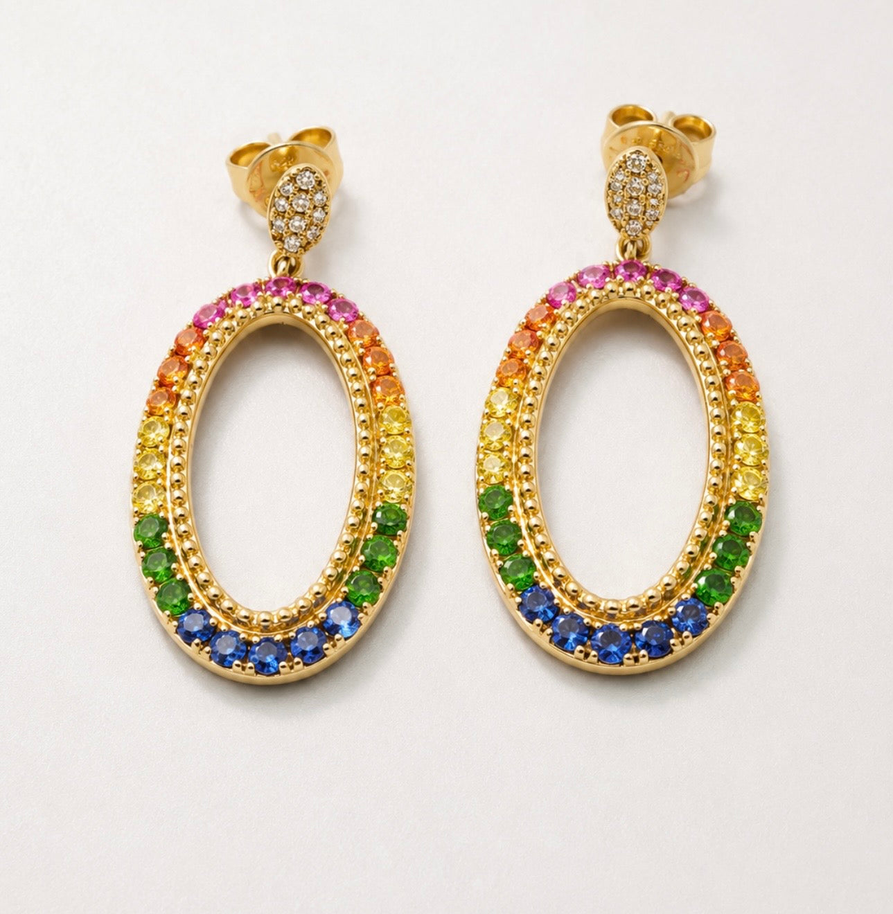 14k, yellow gold, natural sapphire rainbow earrings. .06 diamond total weight.