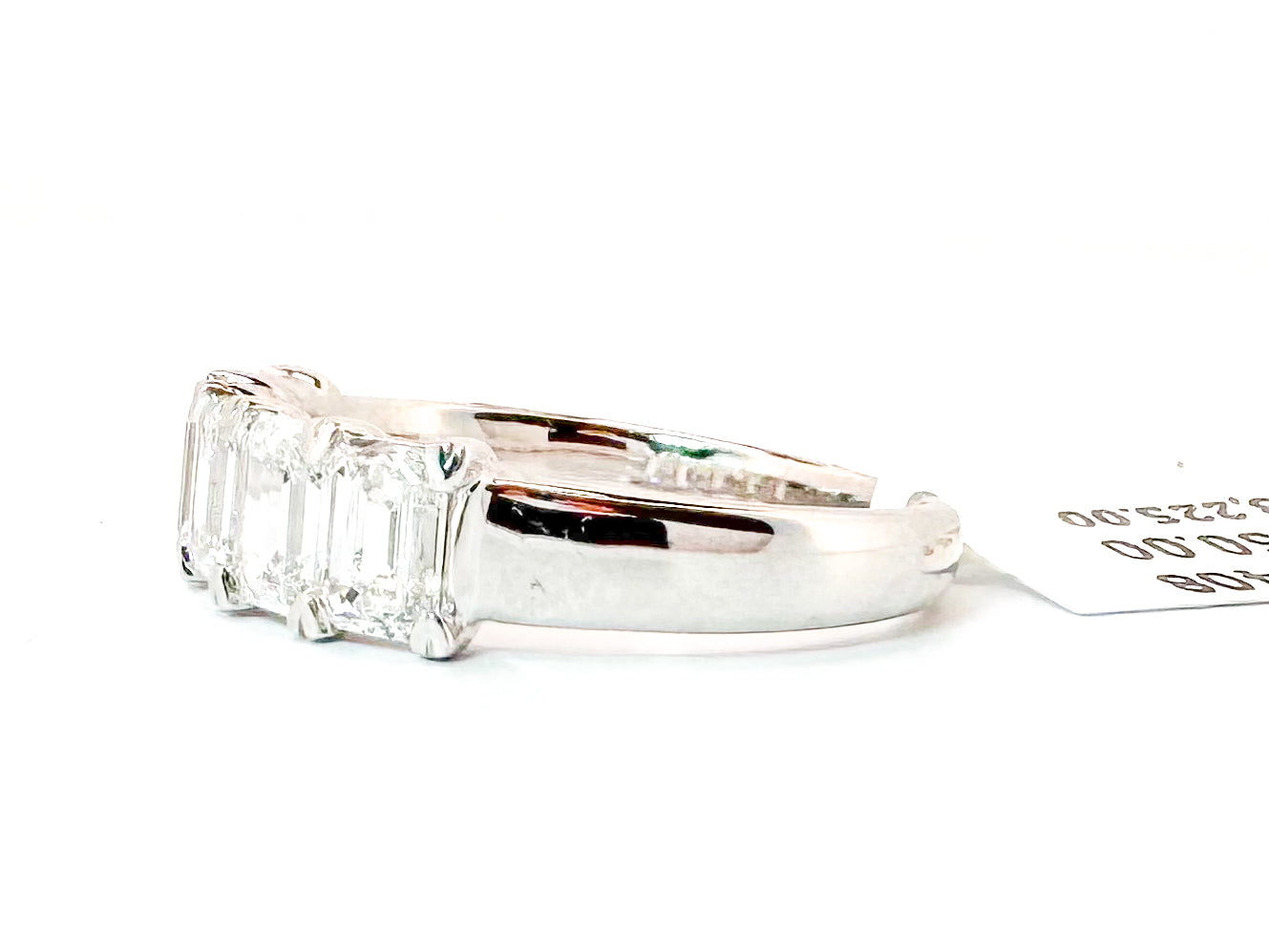 14k, White gold, five lab diamond, emerald cut band. 2.00 carat total weight.