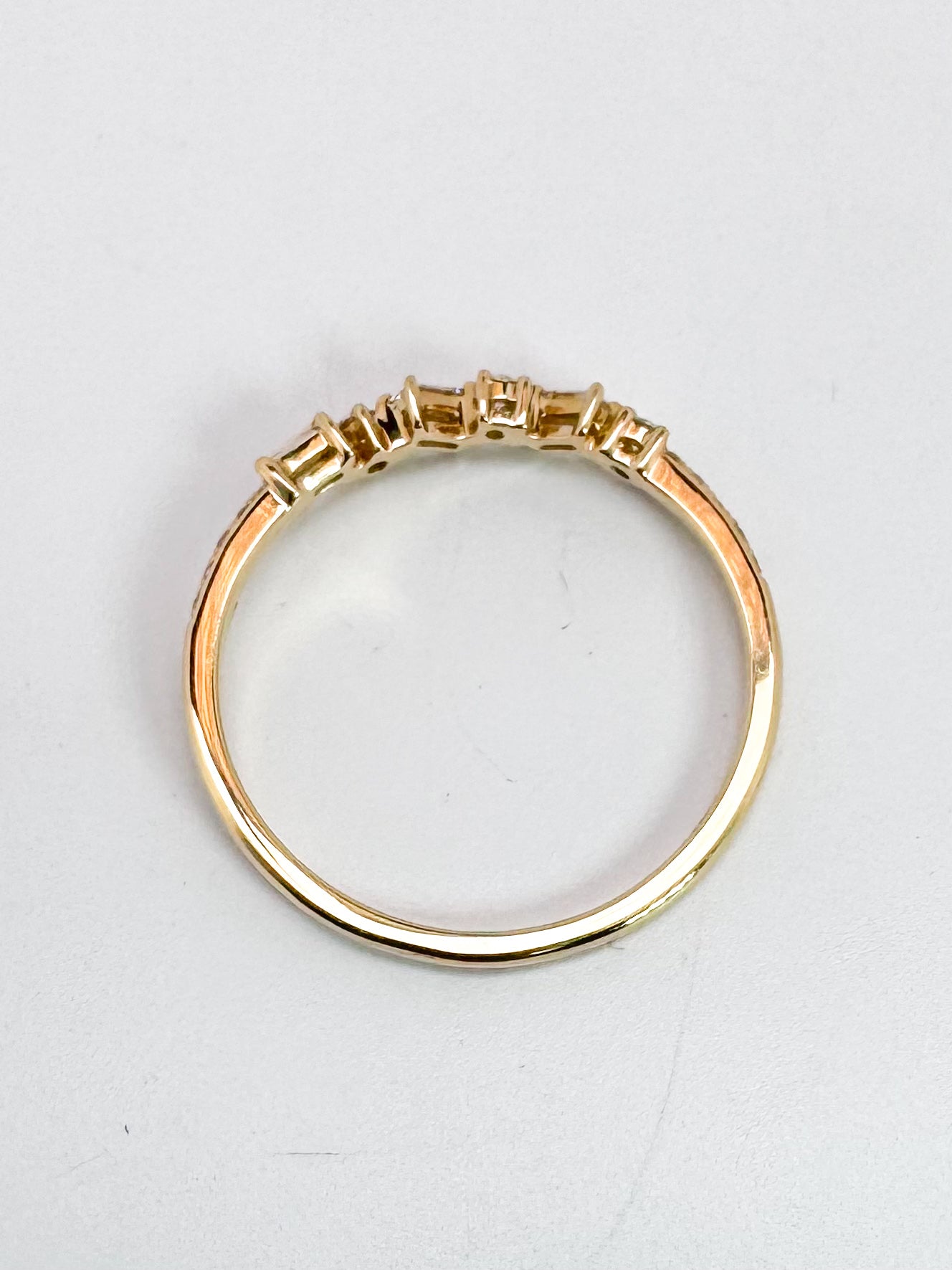 14K, Yellow gold .23 diamond total weight, baguette and round brilliant diamond band