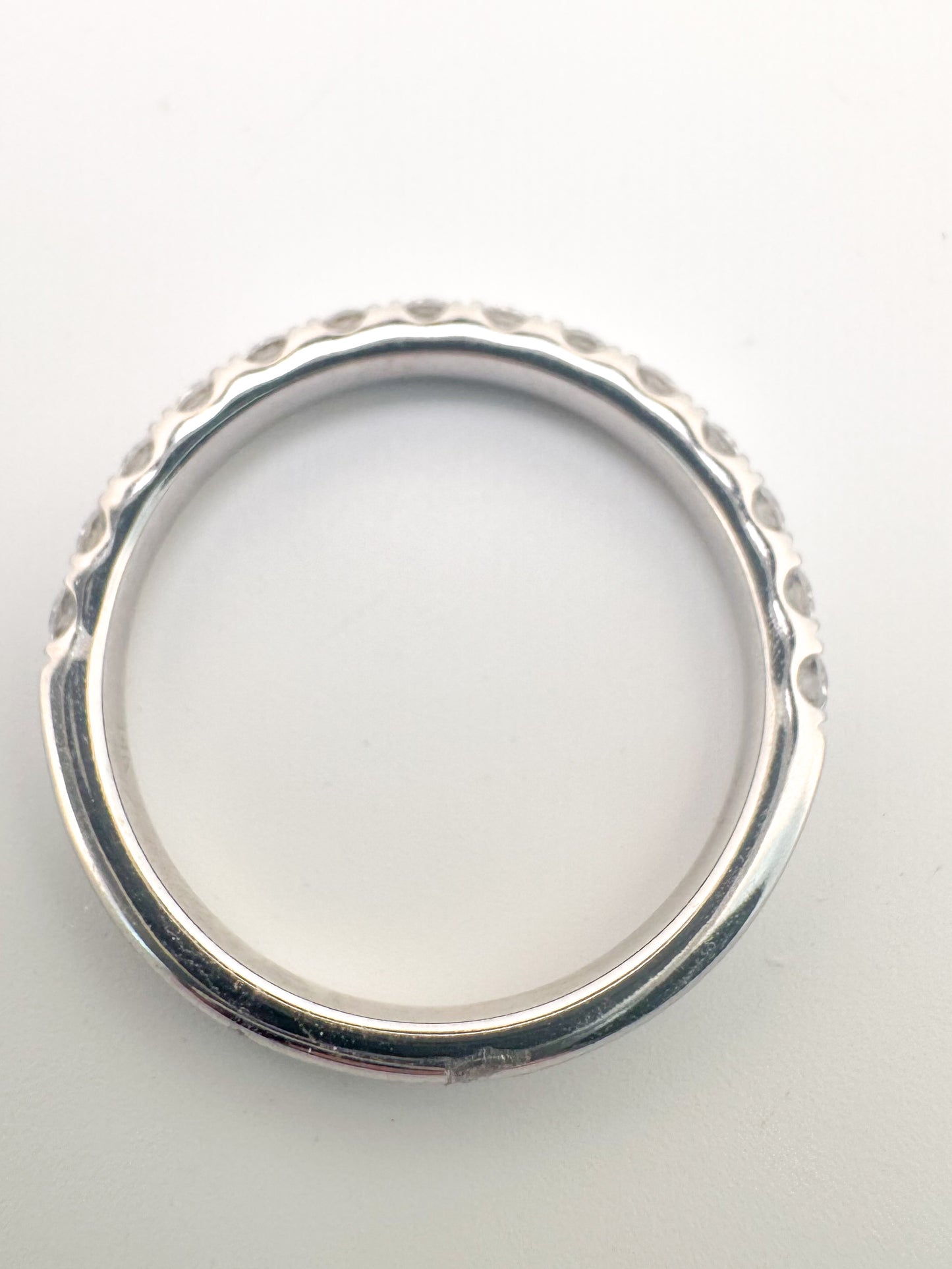 14k, White gold, .65 natural diamond wedding band. VS2 G