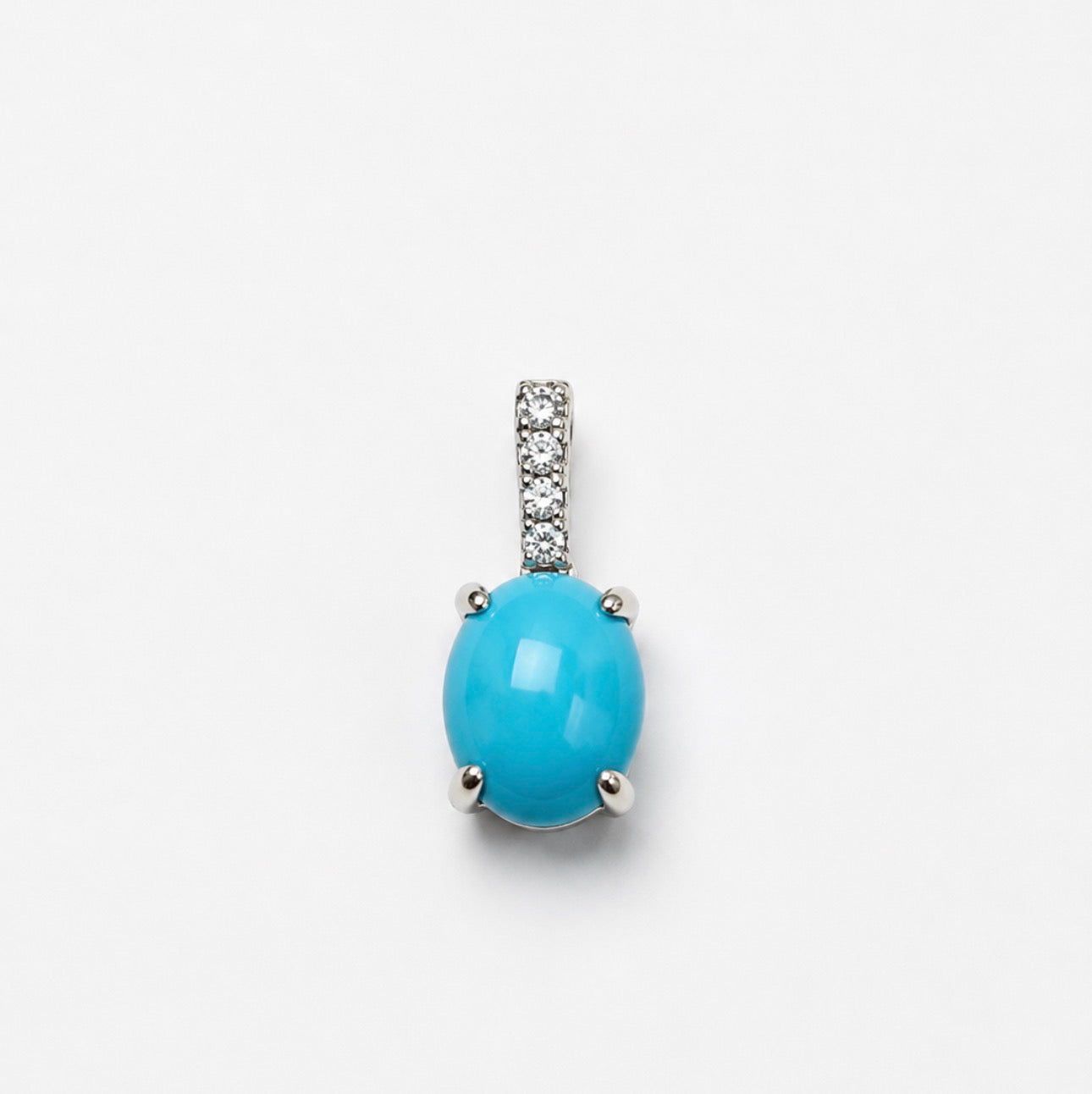 14k, white gold, turquoise and diamond pendant.