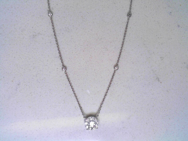 Diamond halo pendant with bezel diamonds on chain