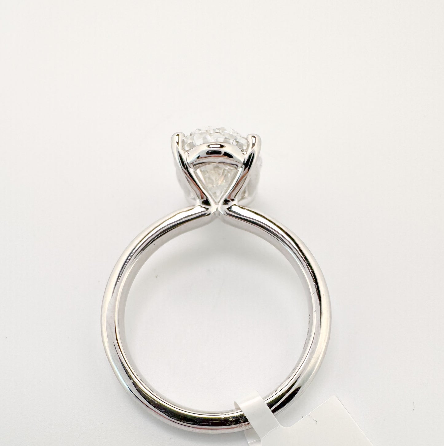 14k, White gold solitaire, set with 4.02 carat lab grown oval diamond. GIA Certified. VS1 E