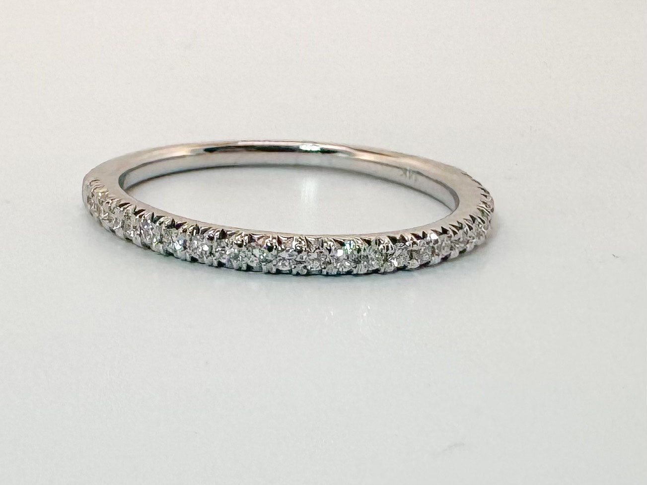 14K,. White gold .15  carat total weight natural diamond wedding band