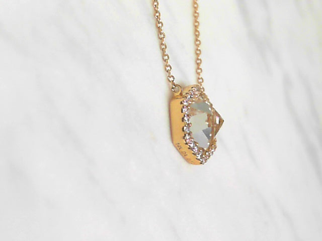 Hexagonal white quarta and diamond pendant.