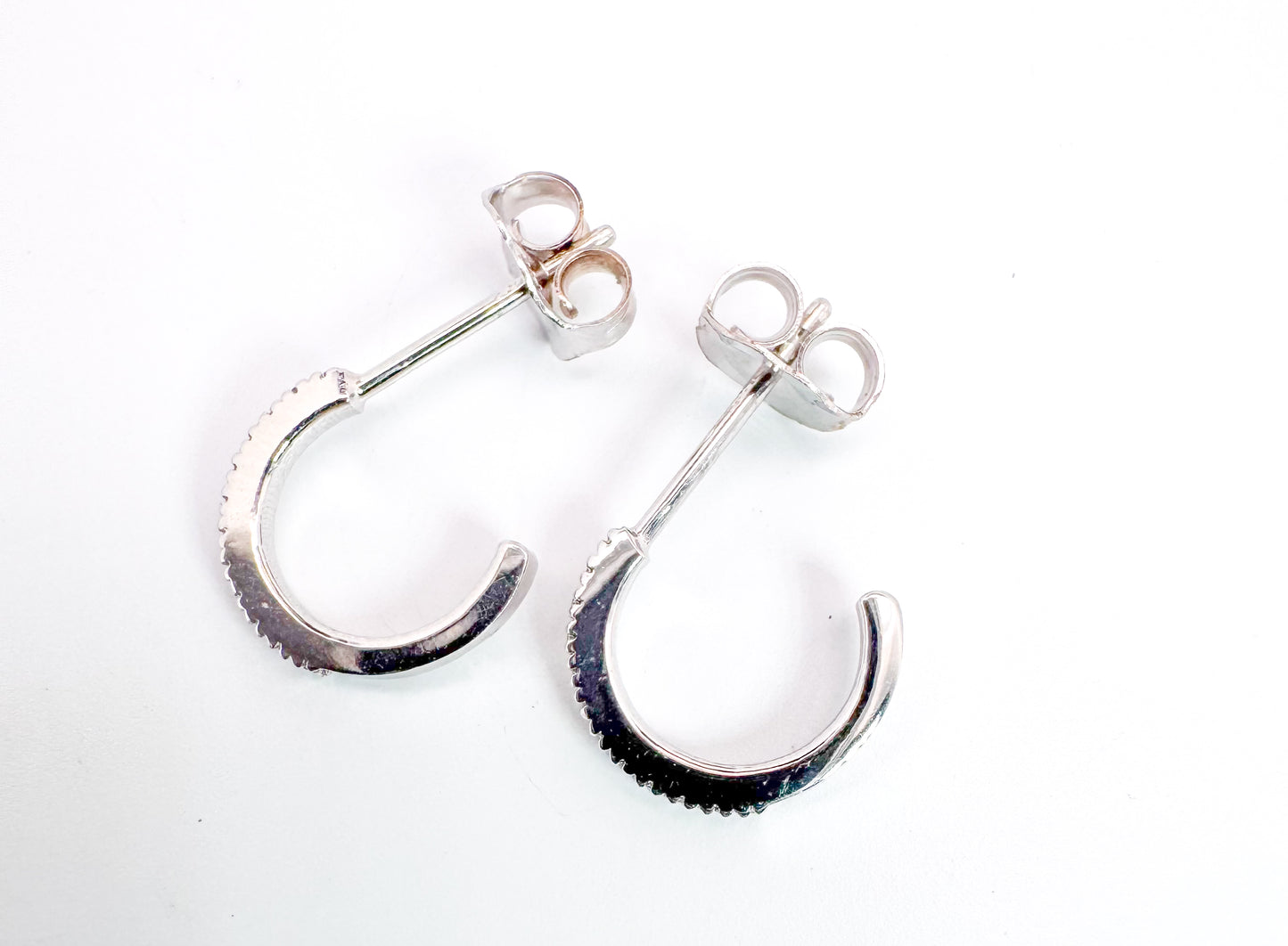 14K, white gold, .10 DTW natural diamond huggie hoop earrings.