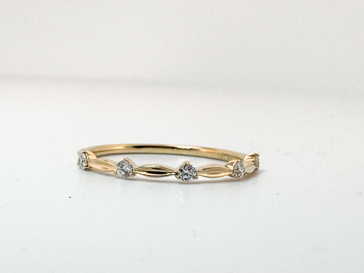 14k, Yellow gold, .11 dtw, natural diamond scalloped band.