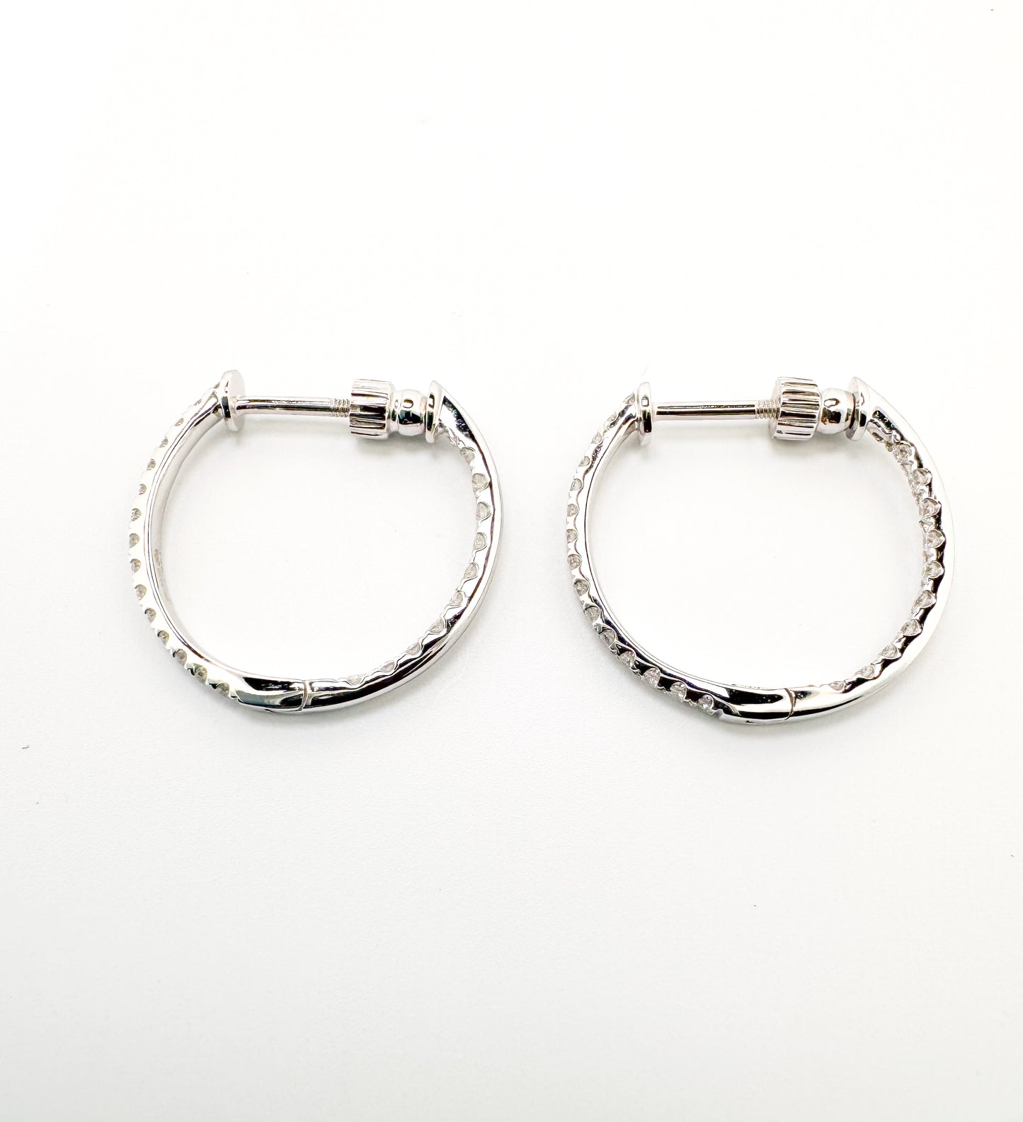 14k, white gold, .60 diamond total weight, inside out, hoop earring with screw backs.