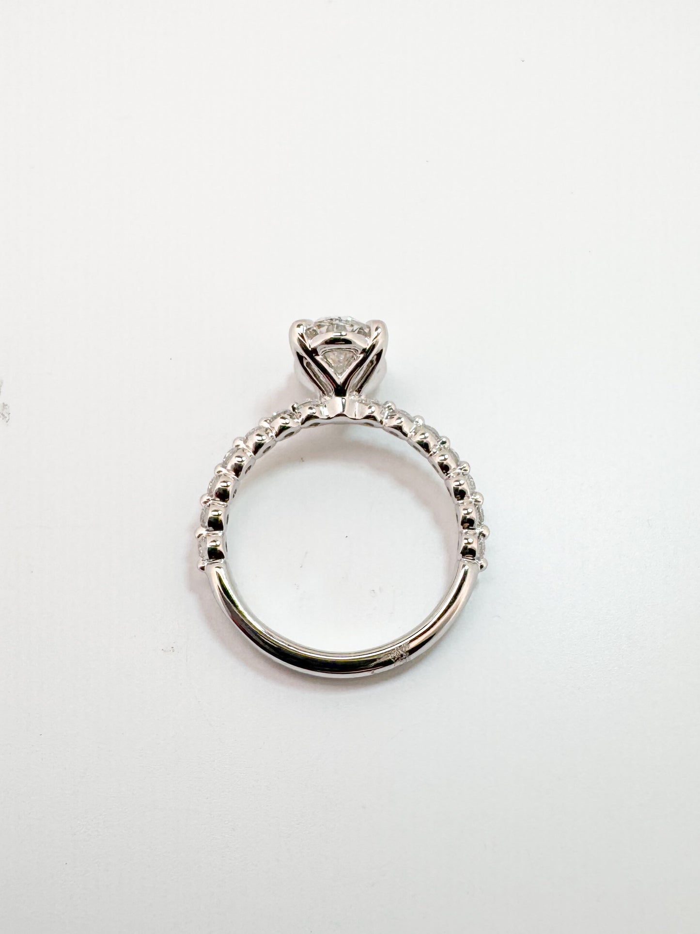 14KW, 1.98 carat lab grown oval, VS1 F, Set with .41 carats of side diamonds IGI certified