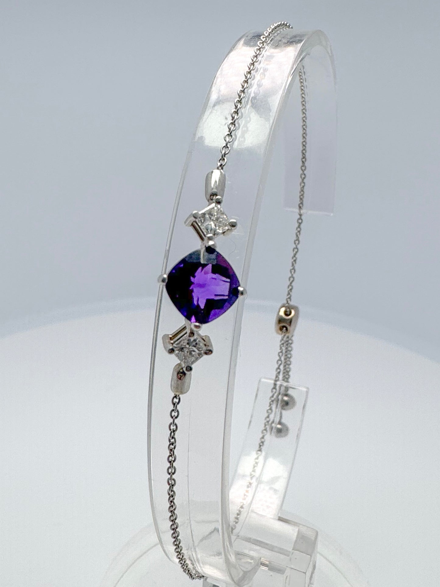 14kw Amethyst and diamond bolo style bracelet.