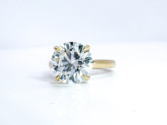 14K, Yellow gold, 5.01 F VS2 ideal cut set in solitaire. IGI Certified