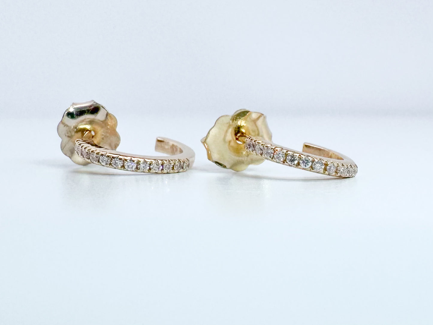 14K, yellow gold .10 diamond total weight, huggie earrings.