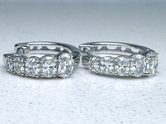 14k, white gold 1.30 diamond total weight earrings.