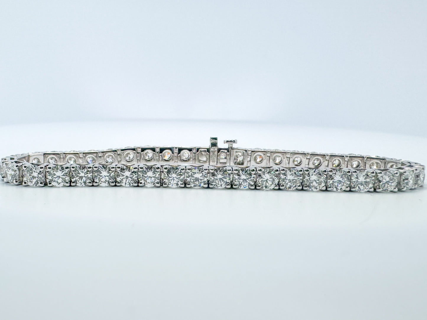 14k white gold 10.08 carat diamond tennis bracelet.