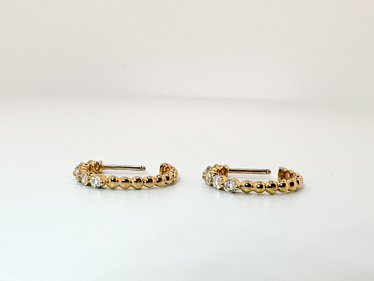 14K,Yellow gold, .38 diamnd total weight, huggie diamond hoop.