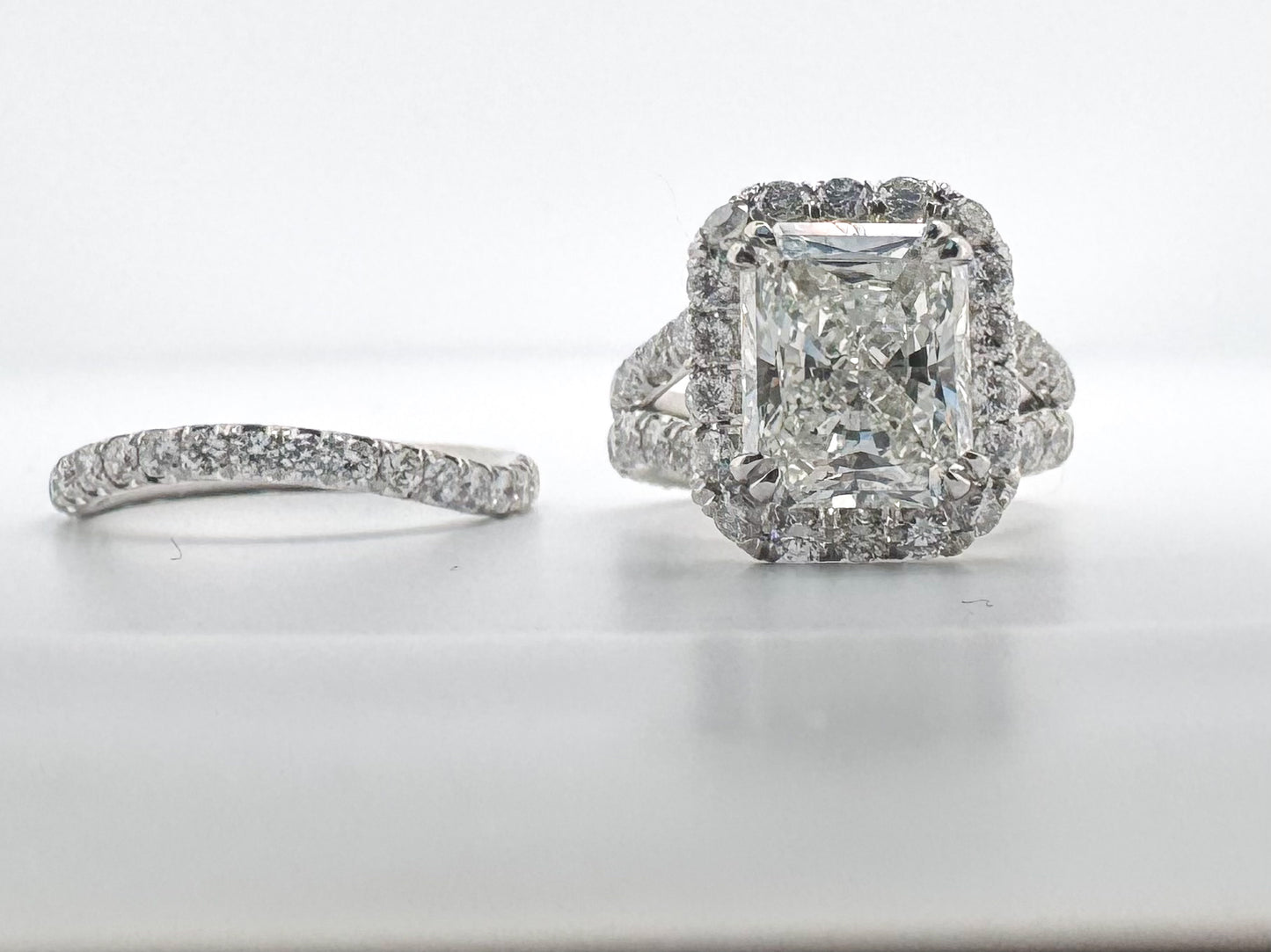 Platinum, 3.54 Carat, natural cushion cut diamond set with 3.00 carats of side diamonds. GIA certified!