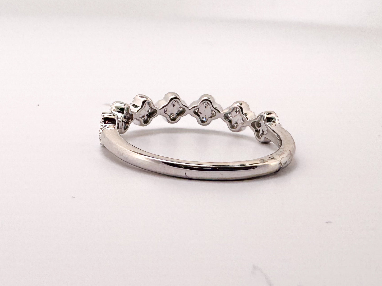 14k, White gold .25 carat total weight, clover diamond band.