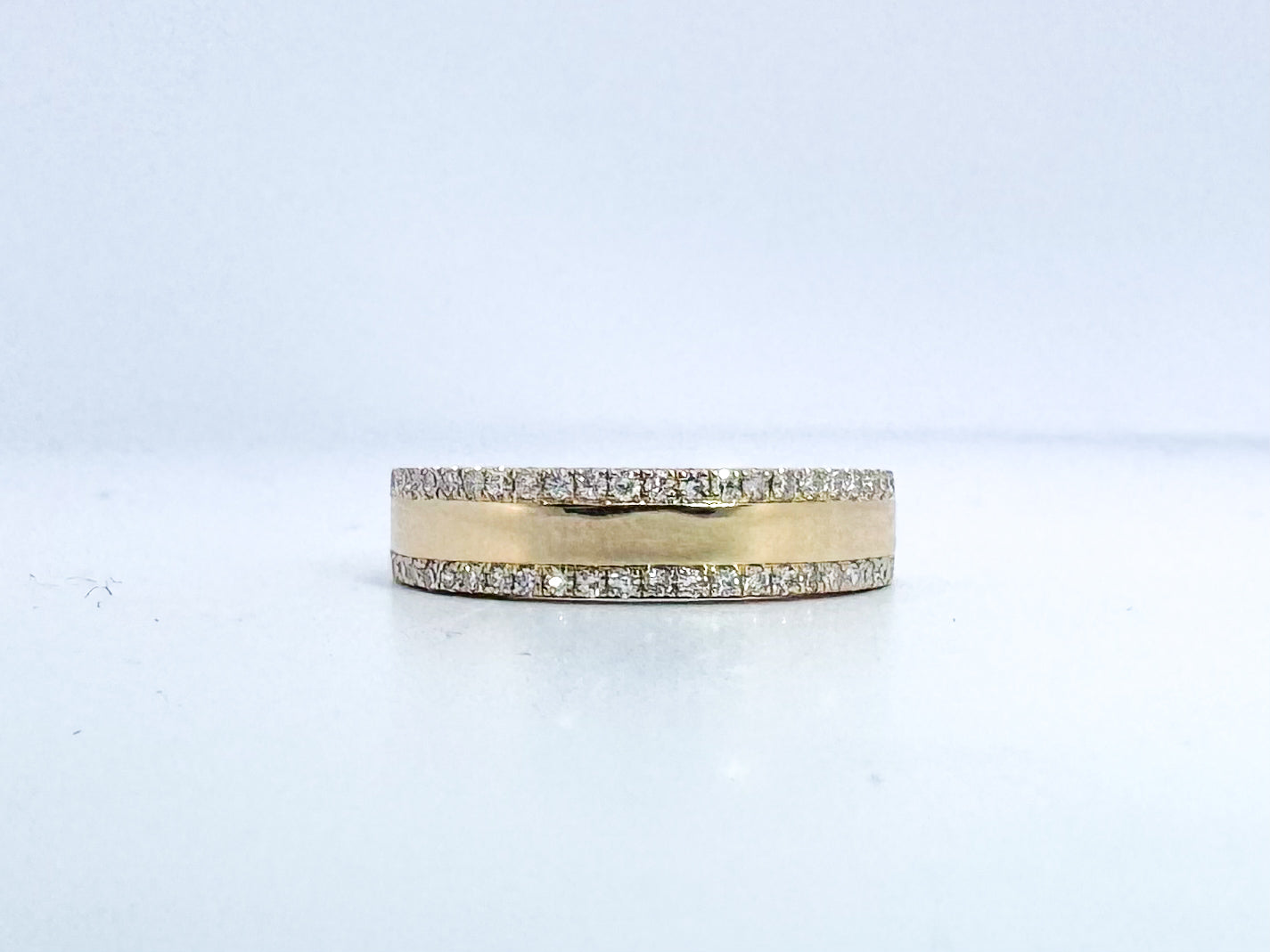 14k, yellow gold .31 diamond total weight double row band.