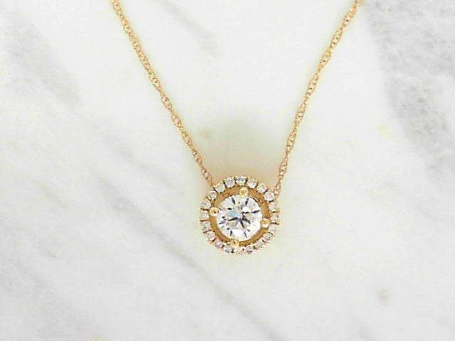 Diamond halo pendant