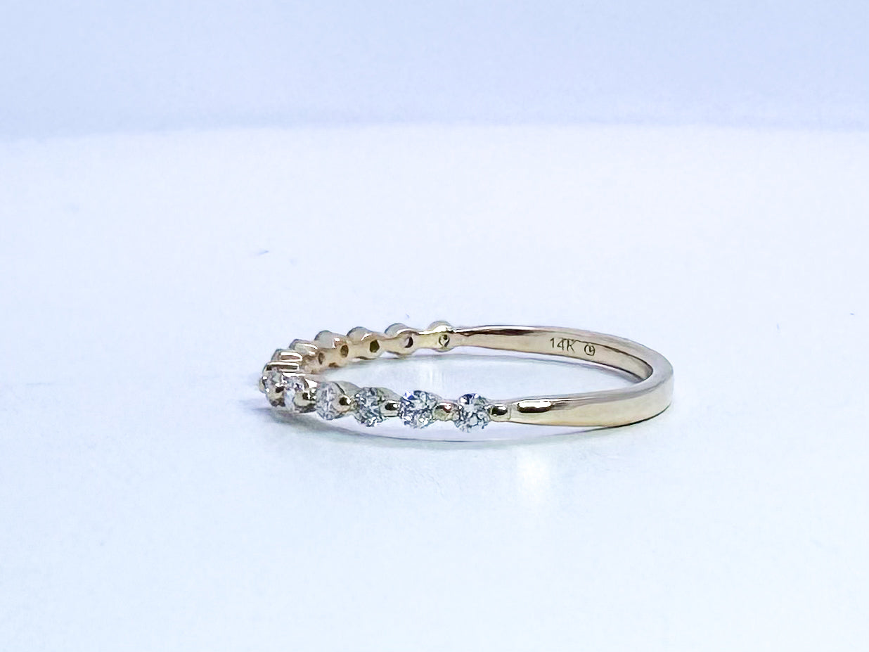 14K, yellow gold open concept, natural diamond band. .24 carat total weight