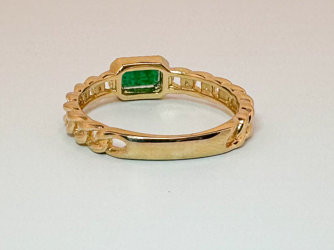 14k, yellow gold, .30 carat natural Emeald set with .05 diamond halo. Link style fashion ring