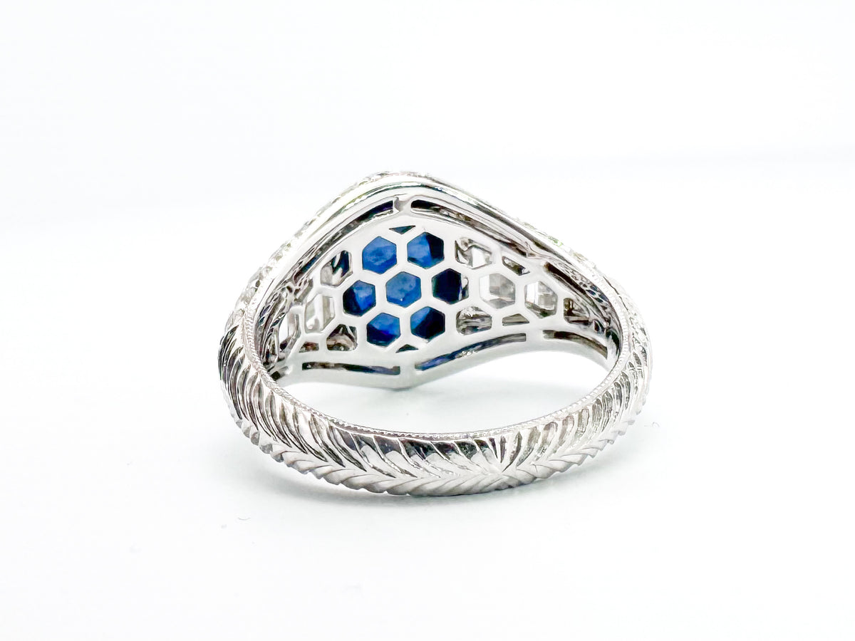 6.27 Carat, natural cabochon sapphire, set in custom hand engraved, 1.60 diamond total weight mounting.