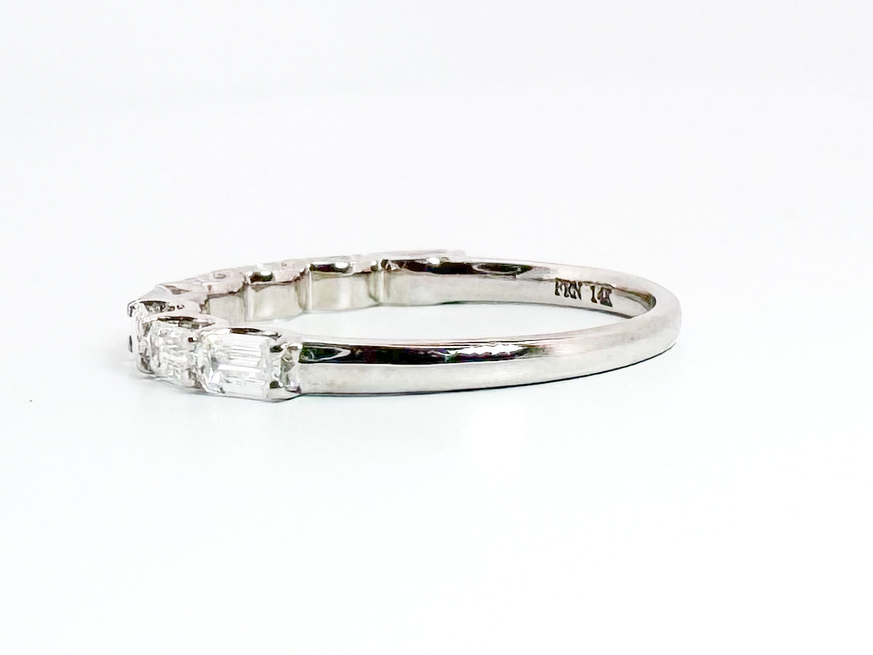 14k, white gold, lab grown, emerald cut diamond band. .80 carat total weight. East/West set
