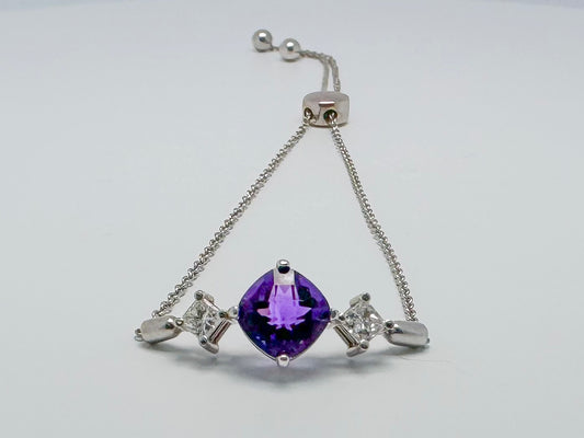 14kw Amethyst and diamond bolo style bracelet.