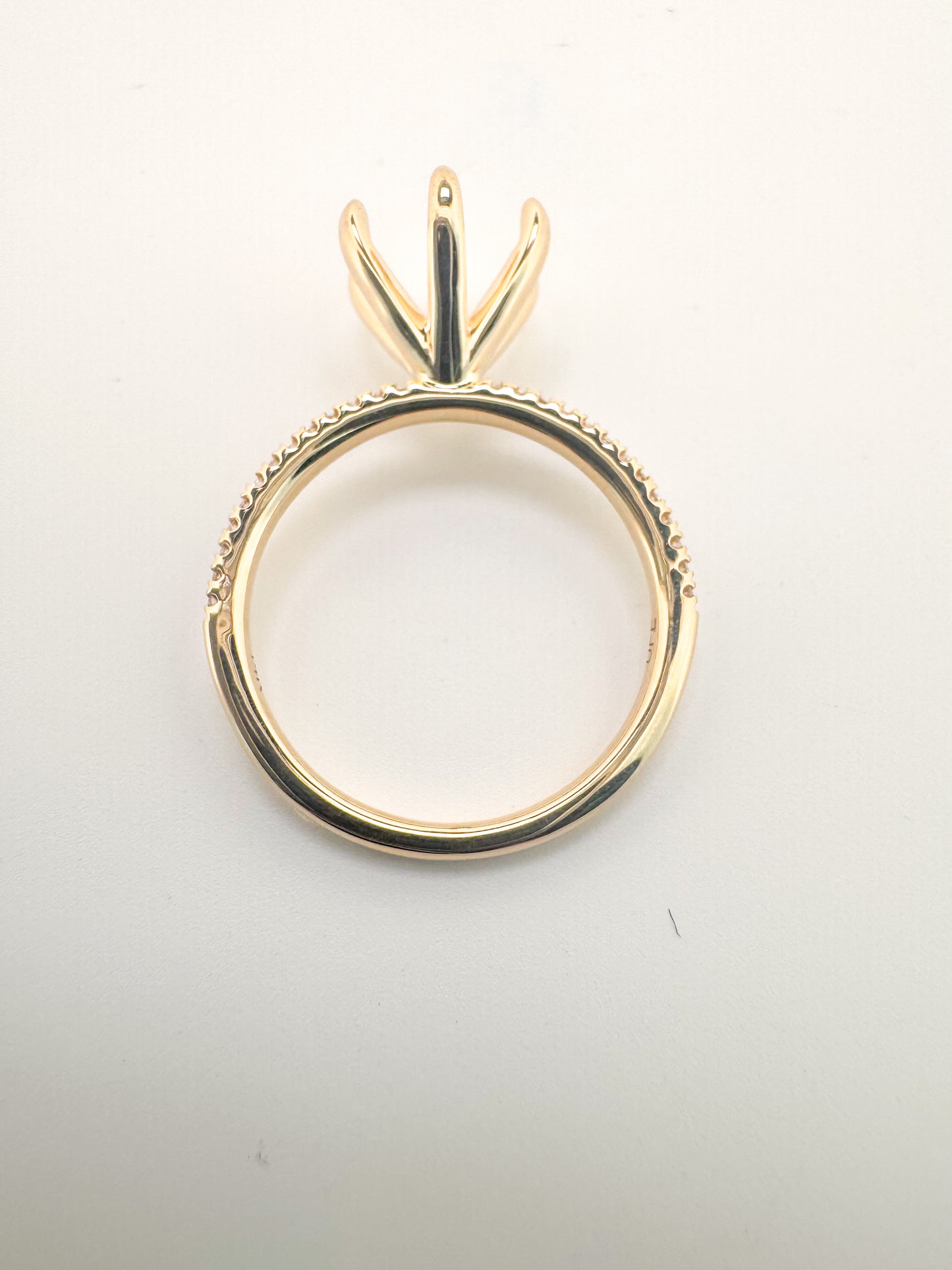 14K, yellow gold .13 side diamond total weight, Semi mount to hold 8mm stone.