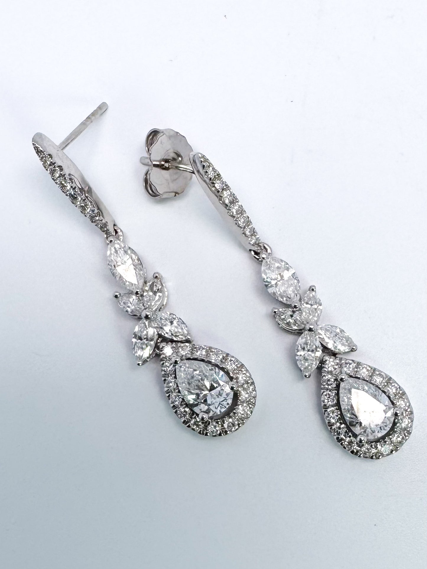 14kw 2.00 ctw lab diamond dangle earrings.