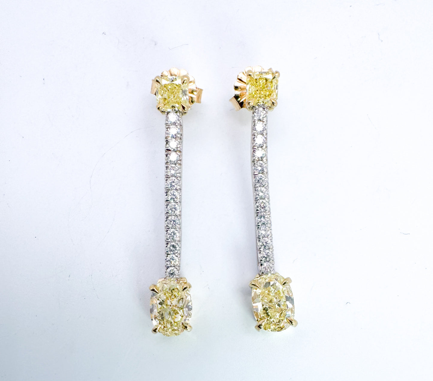 18k two tone NATURAL Fancy yellow Diamond earrings.2.37 carats of yellow diamonds and .30 carats of white diamonds.