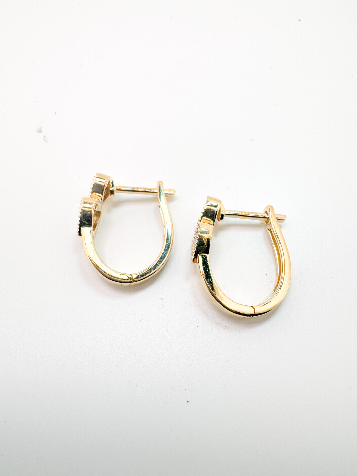 14k, yellow gold, double pave heart earrings.