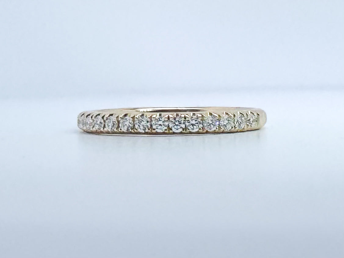 14k, yellow gold .22 dtw french pave daimond band.