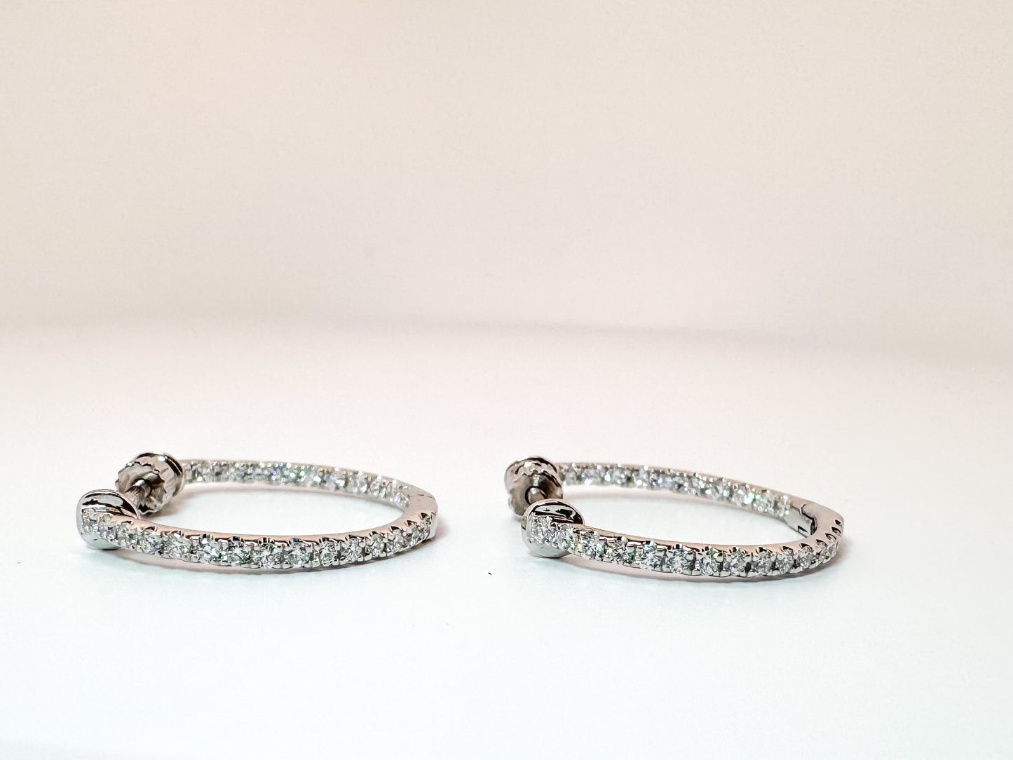 14k, white gold, .60 diamond total weight, inside out, hoop earring with screw backs.