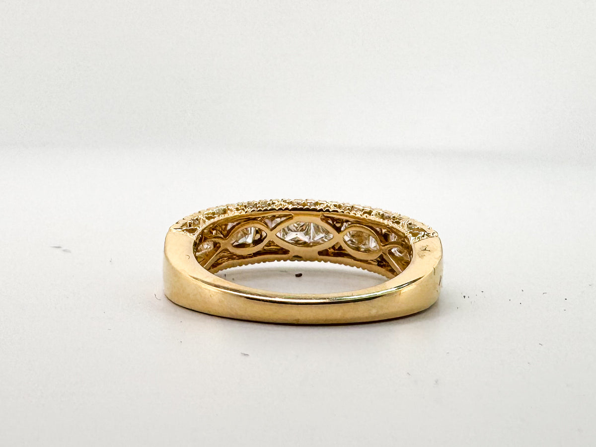 14k, Yellow gold ,princess cut and round brilliant diamond band.1.27 carats of natural diamonds.